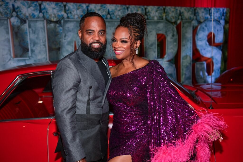 Todd Tucker and Kandi Burruss attend RED HOT Fifty Birthday Celebration For Tameka "Tiny" Harris on July 14, 2025 in Atlanta, Georgia.
